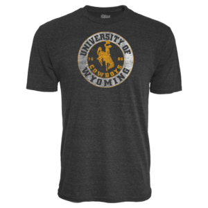 Black men's tee, design is white circle with black words: university of Wyoming arched around, black circle in center with gold bucking horse above gold word cowboys with gold 1886