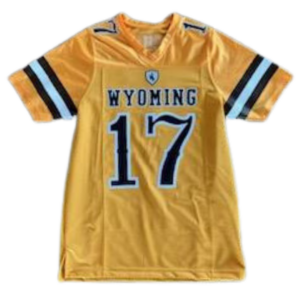 Gold replica football jersey, design is brown word Wyoming white ouline above large brown number 17 white outline, brown then white then brown stripe on each sleeve