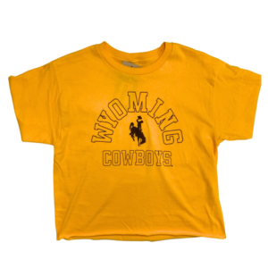 gold women's cropped short sleeved tee. Design is arced word Wyoming with bucking horse, then word Cowboys below. Text is in a brown outline font