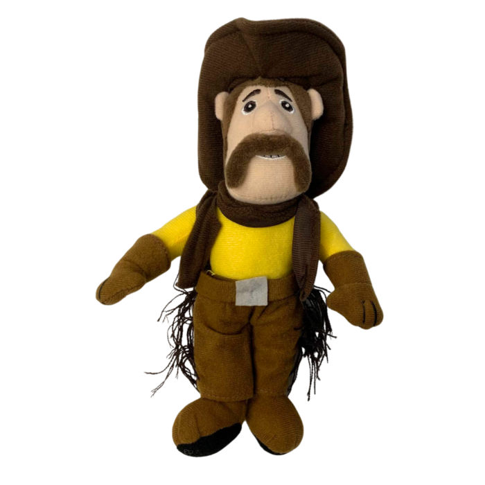 stuffed toy in the shape of the pistol Pete cowboy. Cowboy is dressed in gold shirt, chaps, and brown cowboy hat
