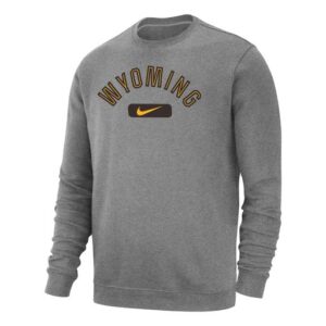Dark grey Nike crewneck, design is gold word Wyoming brown outline arched above brown stripe with gold Nike logo centered