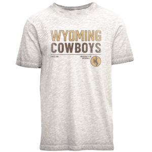 Oatmeal tee, design is gold word Wyoming above brown word cowboys, above brown words since 1886 University of Wyoming, gold circle with brown outline and brown bucking horse on left side