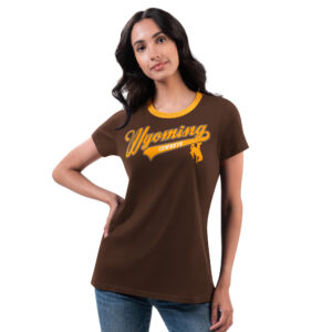 brown women's short sleeved too with gold trim. design on front is Word Wyoming in gold script with a tail. in tail is word Cowboys in small white font