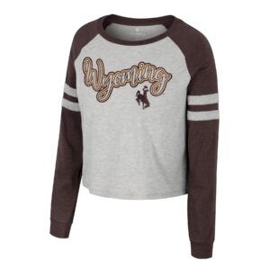 women's long sleeve tee with grey body, and brown sleeves. Word Wyoming with bucking horse below printed in script font