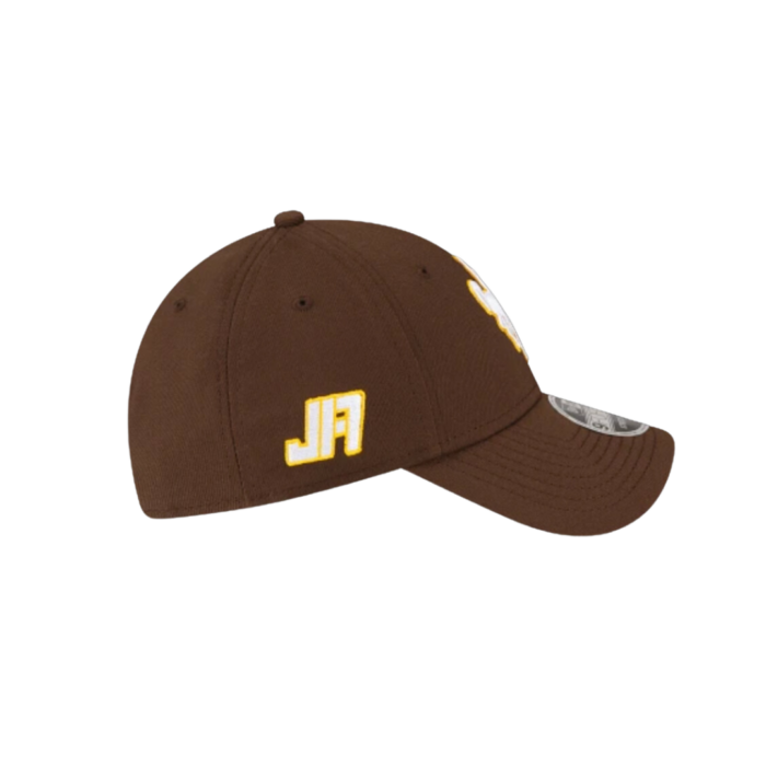 right side view of hat, initials JA printed in athletic block font, in white with gold outline