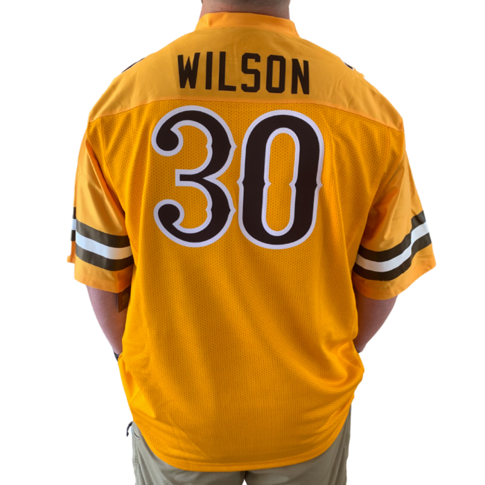 Back of gold replica football jersey, design is brown word WILSON above large brown number 30 white outline, brown then white then brown stripe on each sleeve