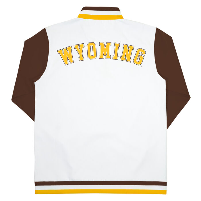 back view of white 1/4 zip with brown sleeves. Word Wyoming across shoulders in gold with brown outline