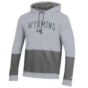 grey hooded sweatshirt with dark grey panel on bottom of sleeves and body. Word Wyoming with bucking horse below printed on front in grey with white outline