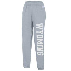 Grey women's sweatpants, design is white word Wyoming vertically down left leg of pant