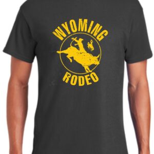 Grey tee, design is gold word Wyoming above gold rodeo logo with gold bucking horse inside, gold word rodeo below