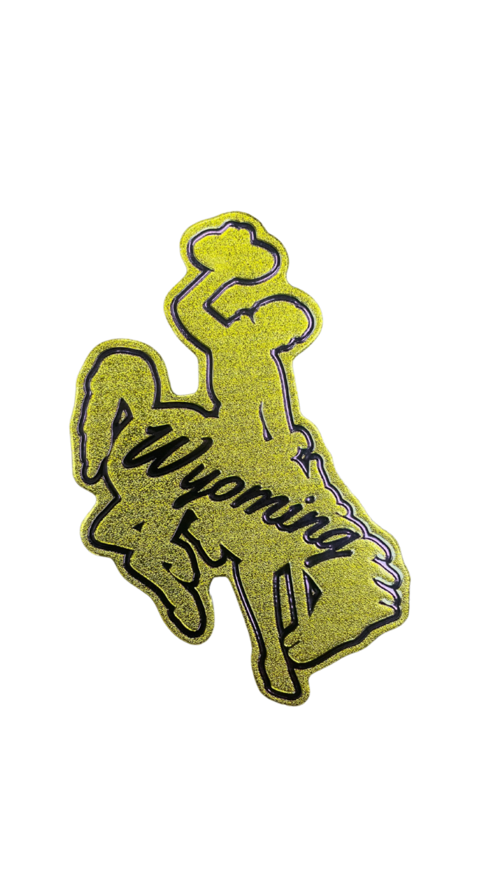 Bucking horse shaped magnet, design is gold metallic coloring with script brown word Wyoming
