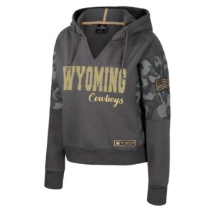 Women's grey hoodie, design is light gold word Wyoming above script light gold word cowboys, grey camo detail on half of sleeves