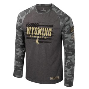Grey long sleeve with grey camo sleeves, design is black rustic flag background with light gold word Wyoming above word cowboys above bucking horse