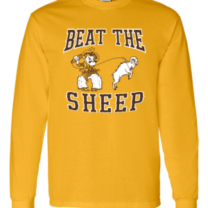 Gold long sleeve tee with slogan Beat the Sheep on front in brown outlined in white. In the middle is a graphic of Pistol Pete roping a sheep. The words Beat The are above the graphic and sheep is below.