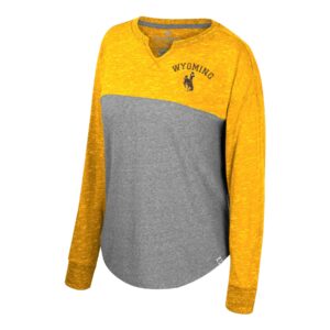 Women's grey long sleeve with gold sleeve and upper torso, design is brown word Wyoming above brown bucking horse on left chest