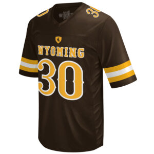Brown youth Logan Wilson replica jersey, design is gold patch with brown bucking horse above gold word Wyoming white outline above gold 30 white outline, gold and white stripes on sleeves