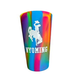 Multicolored silicone cup, design is white bucking horse above white word Wyoming