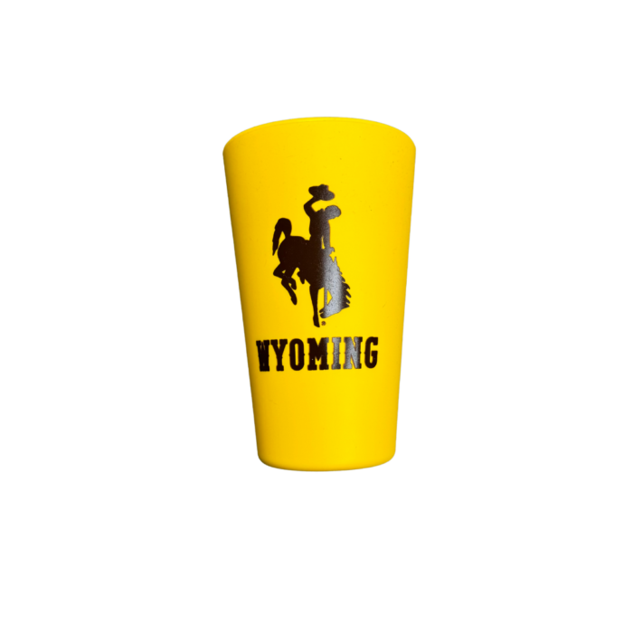 Yellow silicone cup, design is brown bucking horse above brown word Wyoming