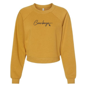 Women's mustard color cropped crewneck, design is brown script word cowboys above brown bucking horse