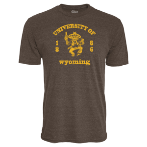 Brown tee, design is gold word university of arched above gold pistol pete with 1886, above gold word Wyoming