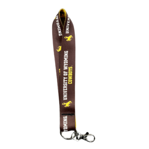 Reversible lanyard, design is brown background white words university of Wyoming gold word cowboys, gold bucking horse, gold reverse side