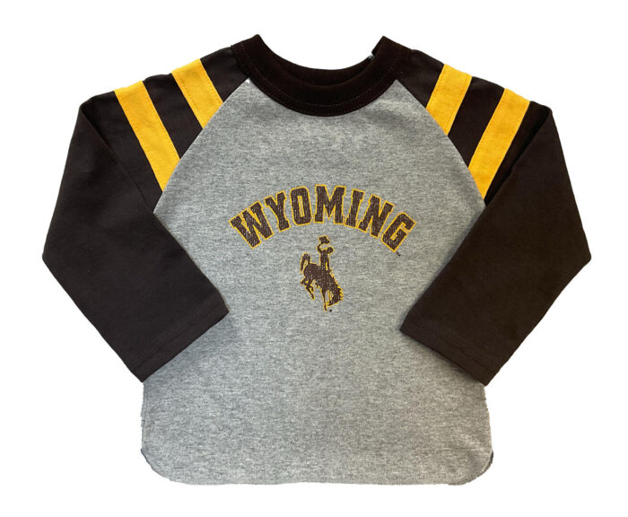 kids long sleeve t-shirt with brown sleeves and shoulders with gold stripes on shoulders. in center of tee, arced Wyoming and bucking horse in brown with gold outline
