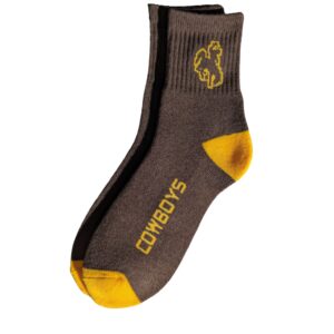 brown crew length socks with gold outline bucking horse on ankle. On bottom of foot, cowboys in gold. Gold toe and gold heel.