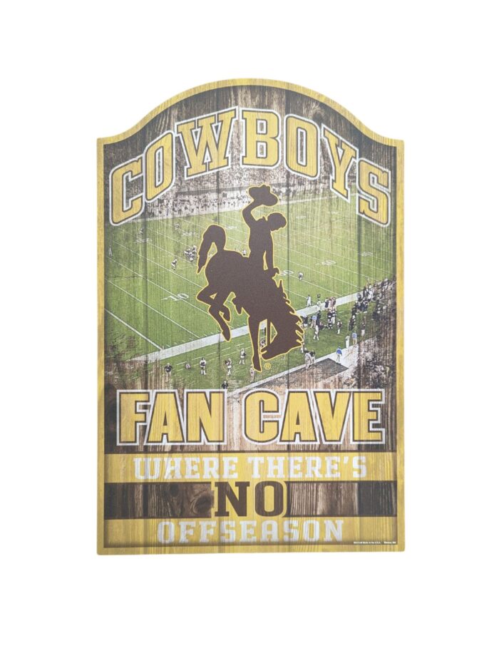 wooden fan cave sign. Design is war memorial as the background, with cowboys, in gold, at top and fan cave 3/4 of the way down. Where there's no off season, wording at bottom
