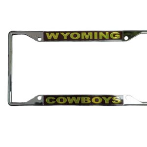 Silver license plate cover. gold Wyoming boxed in, in brown on top. Gold cowboys boxed in, in brown.