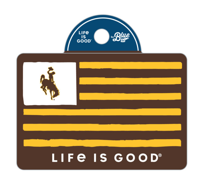 Brown rectangle decal, design is gold flag stripes, with brown bucking horse gold outline in white rectangle in upper corner, above white word life is good