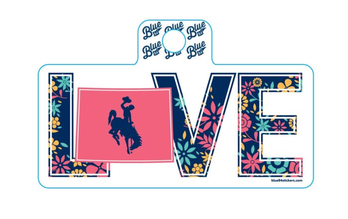 White rectangle shaped decal, design is navy blue word love with multicolored flowers, letter O is Wyoming state shape color pink with navy bucking horse inside