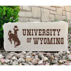 16x7 inch stone. Brown bucking horse to the left. brown, university of wyoming to the right.