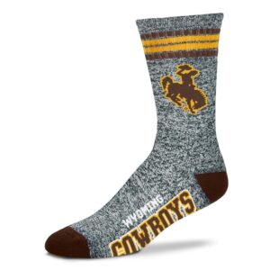 Grey and brown medium length sock. Wyoming cowboys on bottom foot in brown, bucking horse on ankle in brown, brown heel and toe.