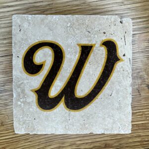 4x4 inch coaster with cursive W in brown with gold outline