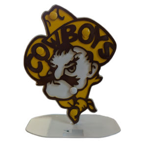 Pistol pete head desk topper. Metal is white, gold, and brown