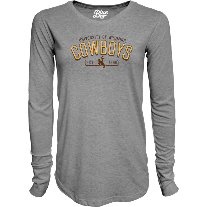 grey long sleeve t-shirt. Design in center chest, university of wyoming in brown arced at top with gold cowboys under. Brown bucking horse and est. 1886 under cowboys.