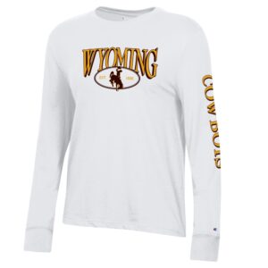 white long sleeve tee. Wyoming in gold with brown outline with oval under in brown with bucking horse in center. On left sleeve cowboys in gold brown outline