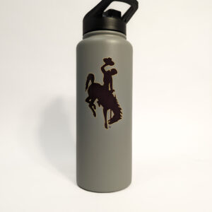 grey 34-ounce water bottle with brown bucking horse on one side. bucking horse has gold outline