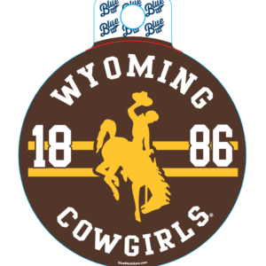 circle decal with brown background, arced wyoming and cowboys at top and bottom in white. 1886 with bucking horse in center