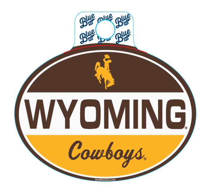 oval decal with brown top white center and gold bottom with Wyoming in brown in center and cowboys in brown at bottom.