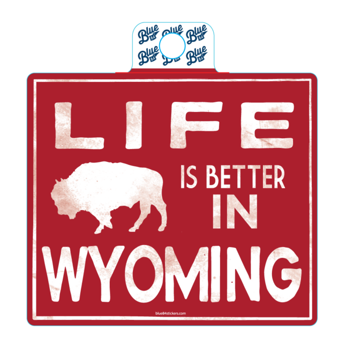 red square decal with life in better in wyoming with buffalo in white.