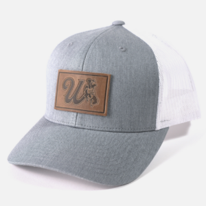 White and grey snapback adjustable hat with patch on front. Patch is brown with cursive W and bucking horse with state flag.