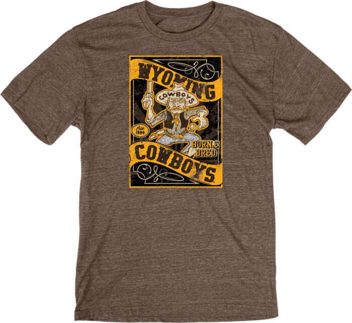 Brown short sleeve tee with retro pistol pete. Pete in center with arced wyoming at top and arced cowboys at bottom. Born and bred above cowboys