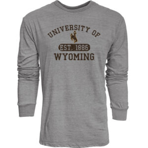 Grey long sleeve tee. Design on front center chest. In brown, University of at top with bucking horse and est. 1886 under. Wyoming at bottom