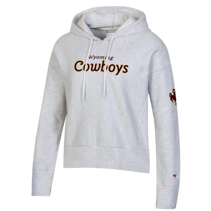 grey cropped hooded sweatshirt. on front, cowboys on center chest with smaller wyoming on top. bucking horse on left sleeve all text is brown with gold outline.