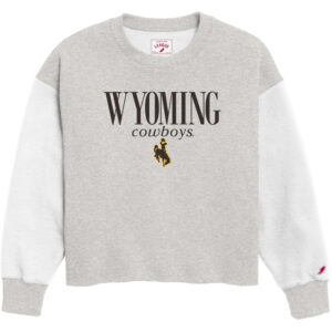 Grey crewneck with white sleeves. Wyoming in large text wit cowboys in small text below n brown. brown bucking horse at bottom