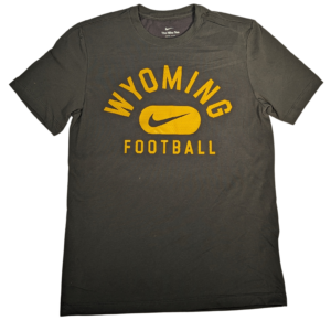 grey short sleeve tee with Arced wyoming in gold with boxed grey nike swoosh with football in gold under.