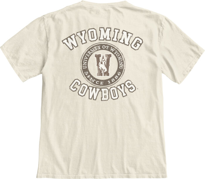 front of ivory short sleeve tee with design in white with brown outline on left chest and back wyoming at top with circle under. in circle is W with bucking horse. under circle, cowboys.