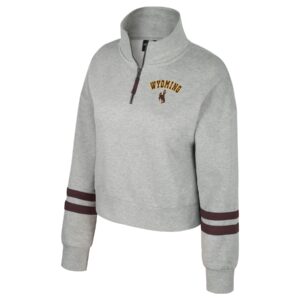grey quarter zip with brown arm bands on forearms. Small wyoming and bucking horse on left chest in brown with gold outline