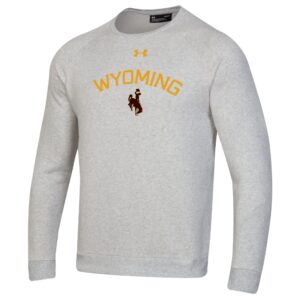 off white crewneck sweatshirt with design center chest. gold arced wyoming with brown bucking horse with gold outline under.